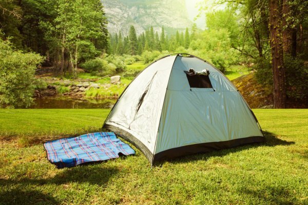 depositphotos_66530273-stock-photo-camping-tent-on-grass.jpg
